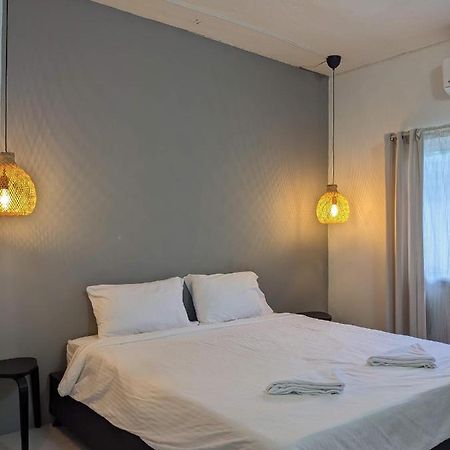 V At Panus Hotel Phanat Nikhom Buitenkant foto