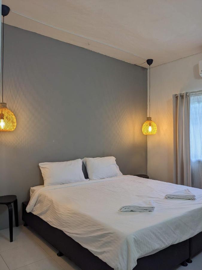 V At Panus Hotel Phanat Nikhom Buitenkant foto